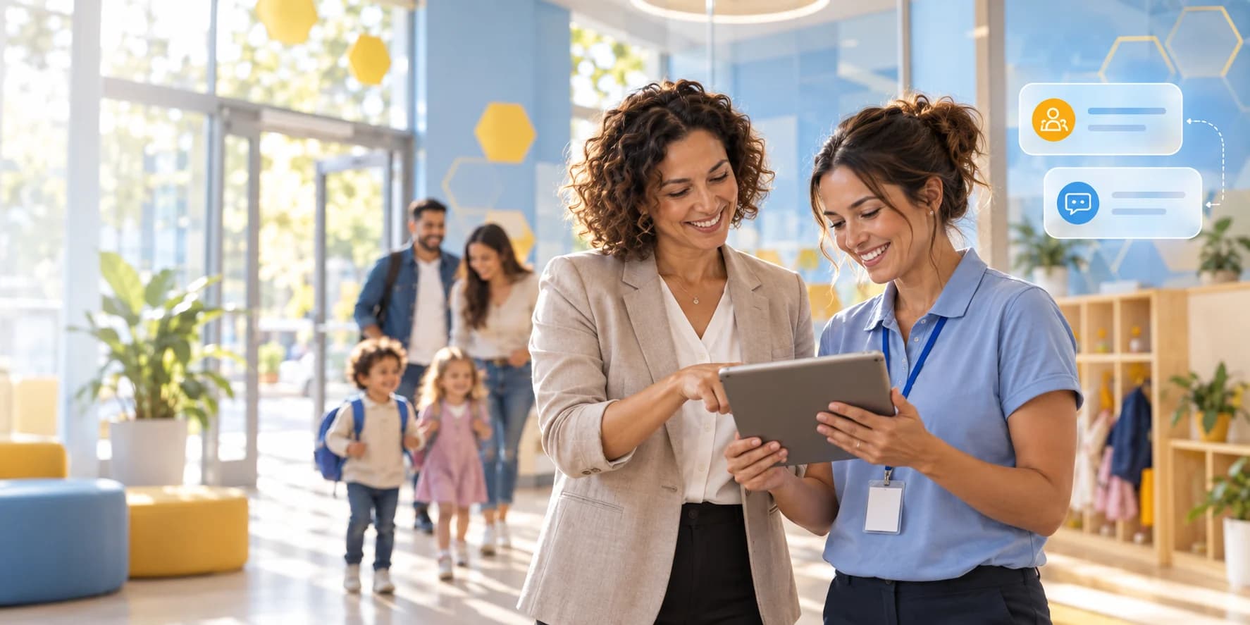A director and teacher collaborate in a blue-and-yellow preschool lobby while a family arrives